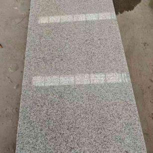 衢州芝麻白光面毛板